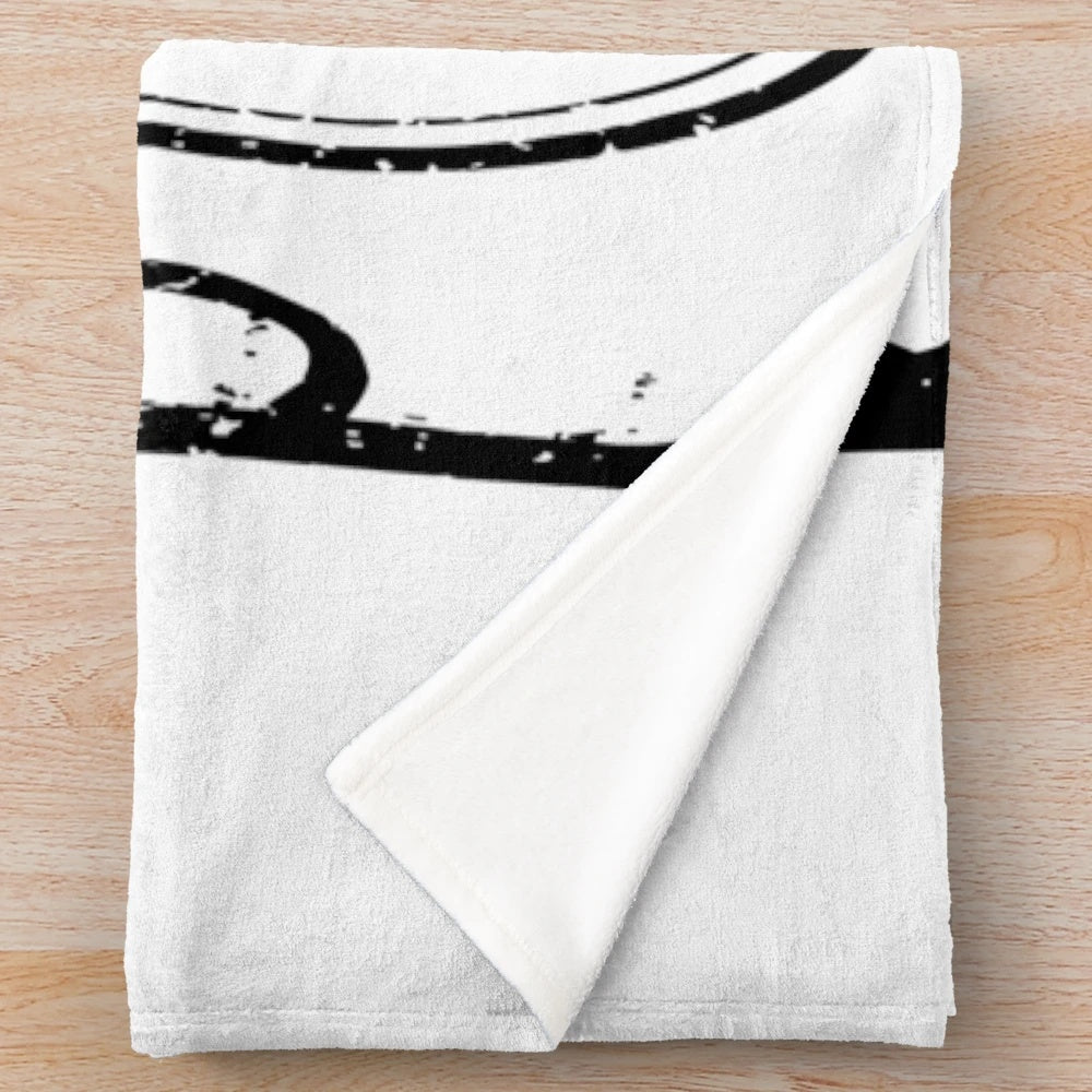 Karma Police themed plush blanket with band graphics and lyrics