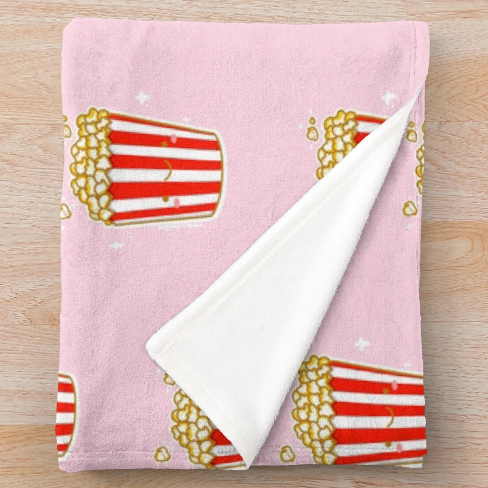 Kawaii plush blanket with cinematic snack inspired design