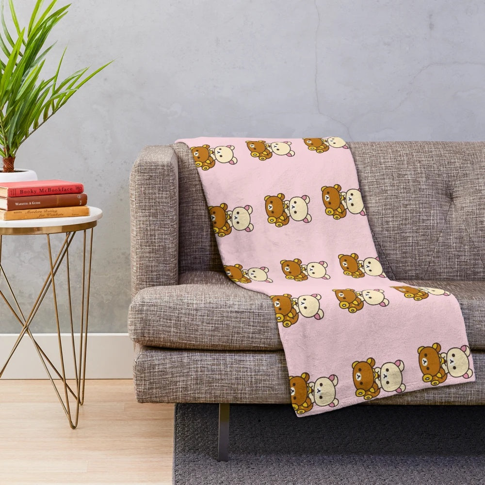 Cute plush blanket featuring Rilakkuma and Korilakkuma in a car design