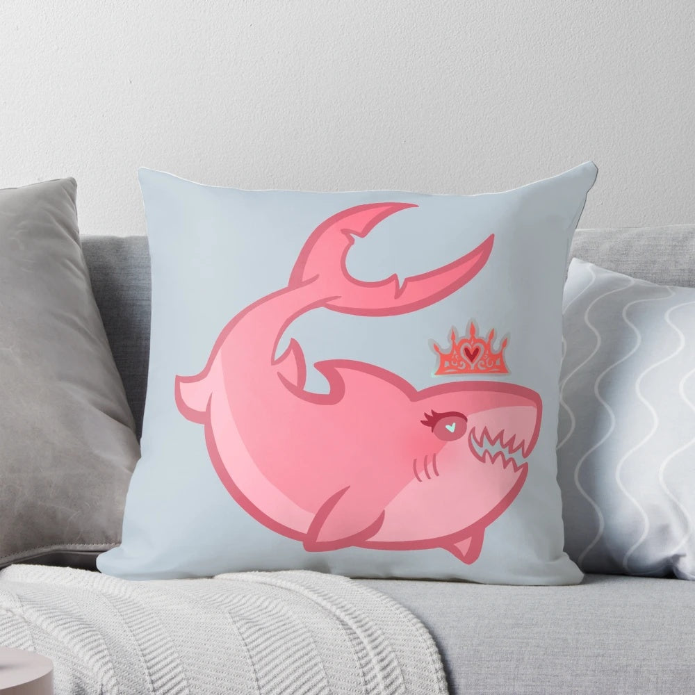 Soft and cuddly shark princess pillow with a crown and tiara design, perfect for a young girl's room.
