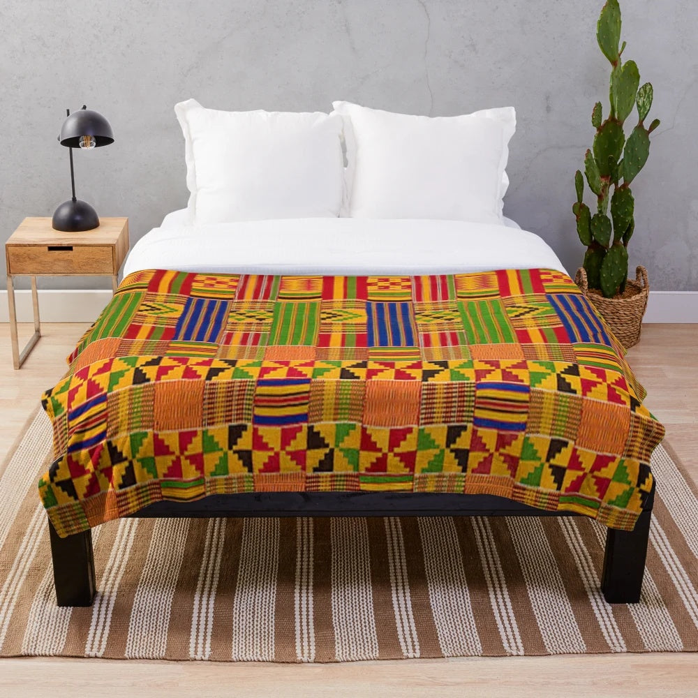 Kente-inspired plush blanket with vibrant ethnic design