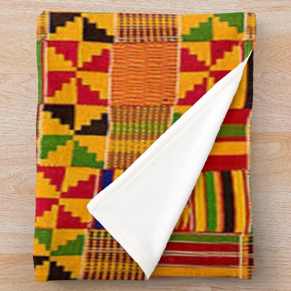 Kente-inspired plush blanket with vibrant ethnic design