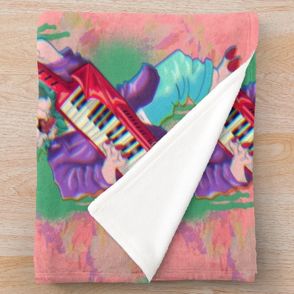 Keytar-inspired plush blanket with an Akita character design