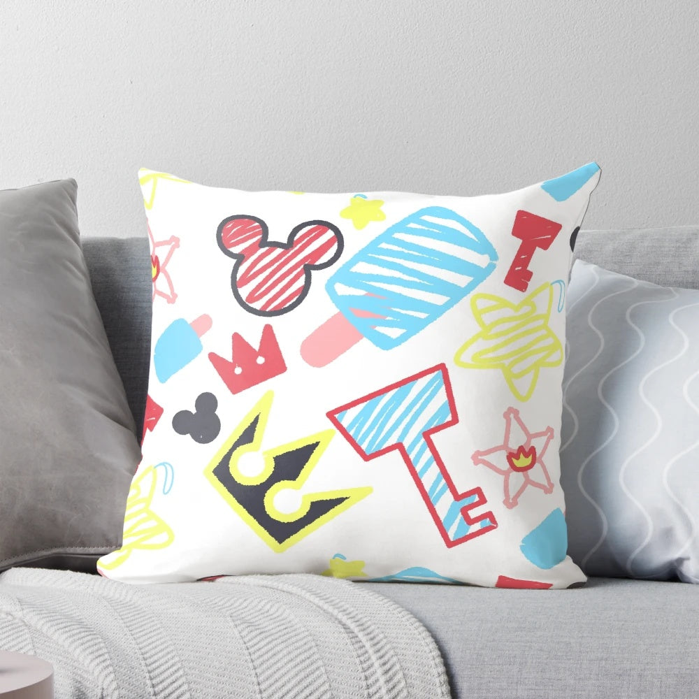A cozy throw pillow featuring charming crayon-style drawings of the iconic Kingdom Hearts characters, including Sora, Kairi, and Riku.