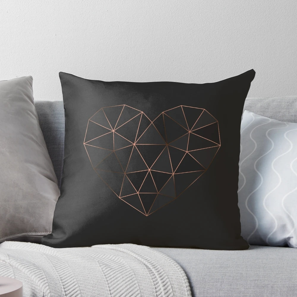 Kintsugi-inspired rose gold and metallic geometric pillow with heart-shaped design