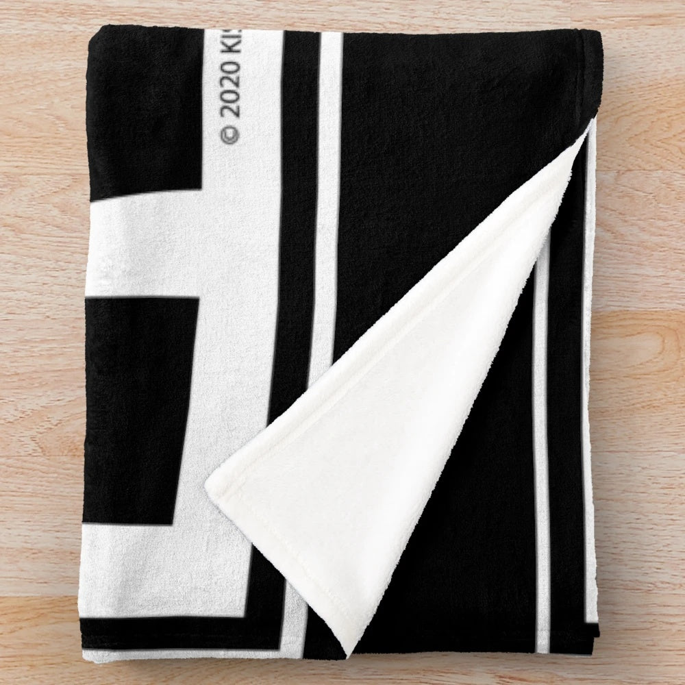 Monochrome plush blanket with a minimalist Kiss band-inspired design