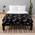 Kiss inspired plush blanket with band faces and logo pattern