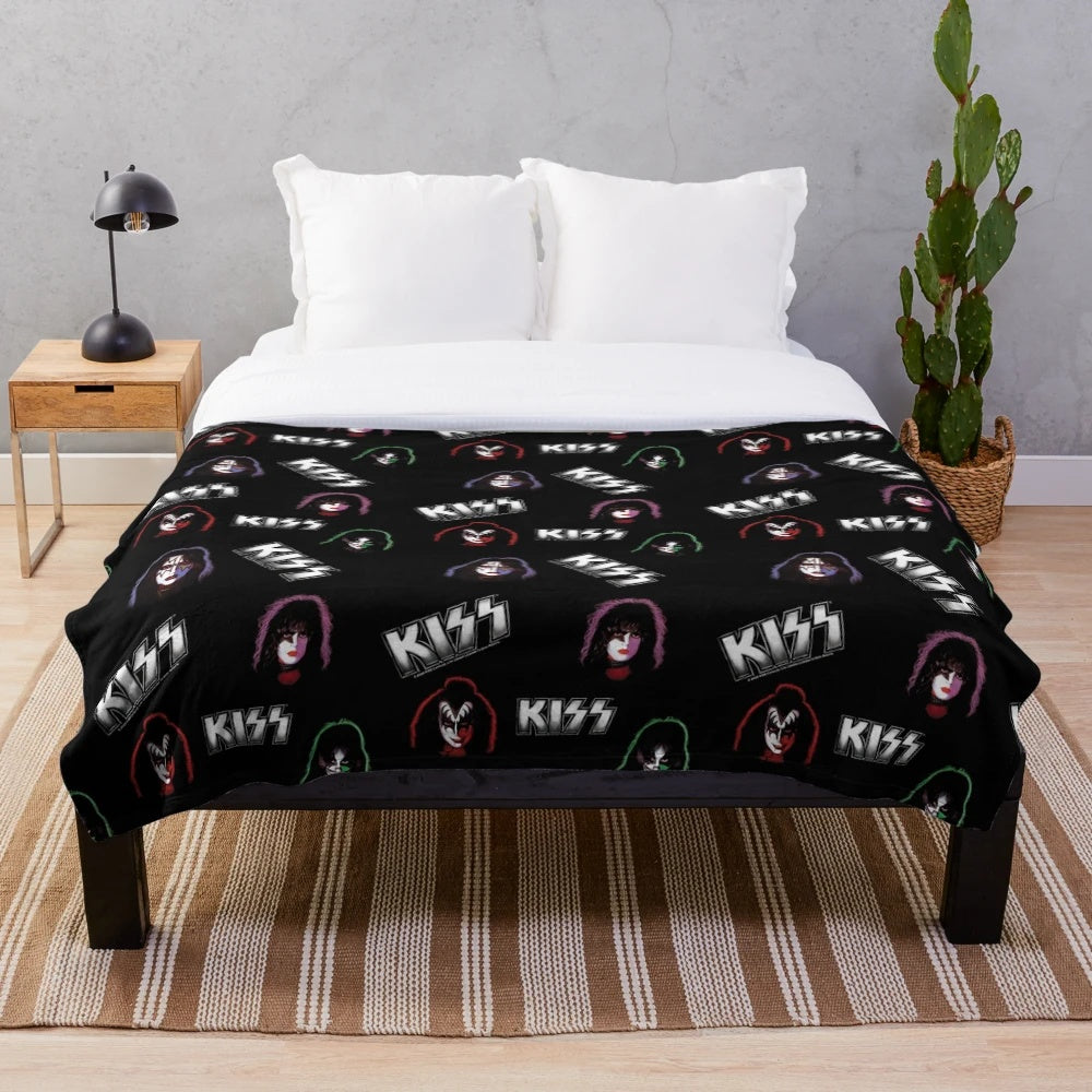 Kiss inspired plush blanket with band faces and logo pattern