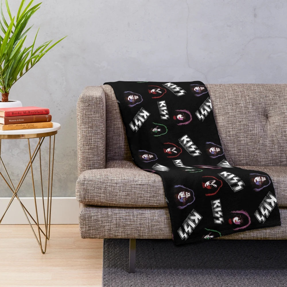 Kiss inspired plush blanket with band faces and logo pattern