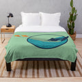Kite surfer silhouette catching waves on a plush blanket