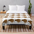Kiwi-inspired plush blanket featuring legendary animals design