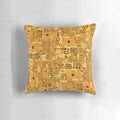 Klimt-inspired decorative pillow with an intricately patterned design in rich amber, gold, and yellow tones.