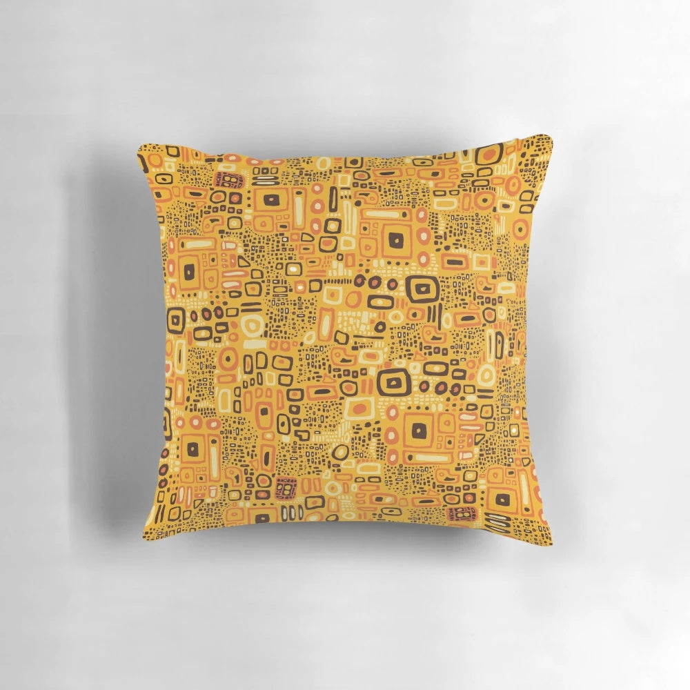 Klimt-inspired decorative pillow with an intricately patterned design in rich amber, gold, and yellow tones.