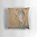 Decorative Klimt-inspired throw pillow featuring a golden cat portrait.