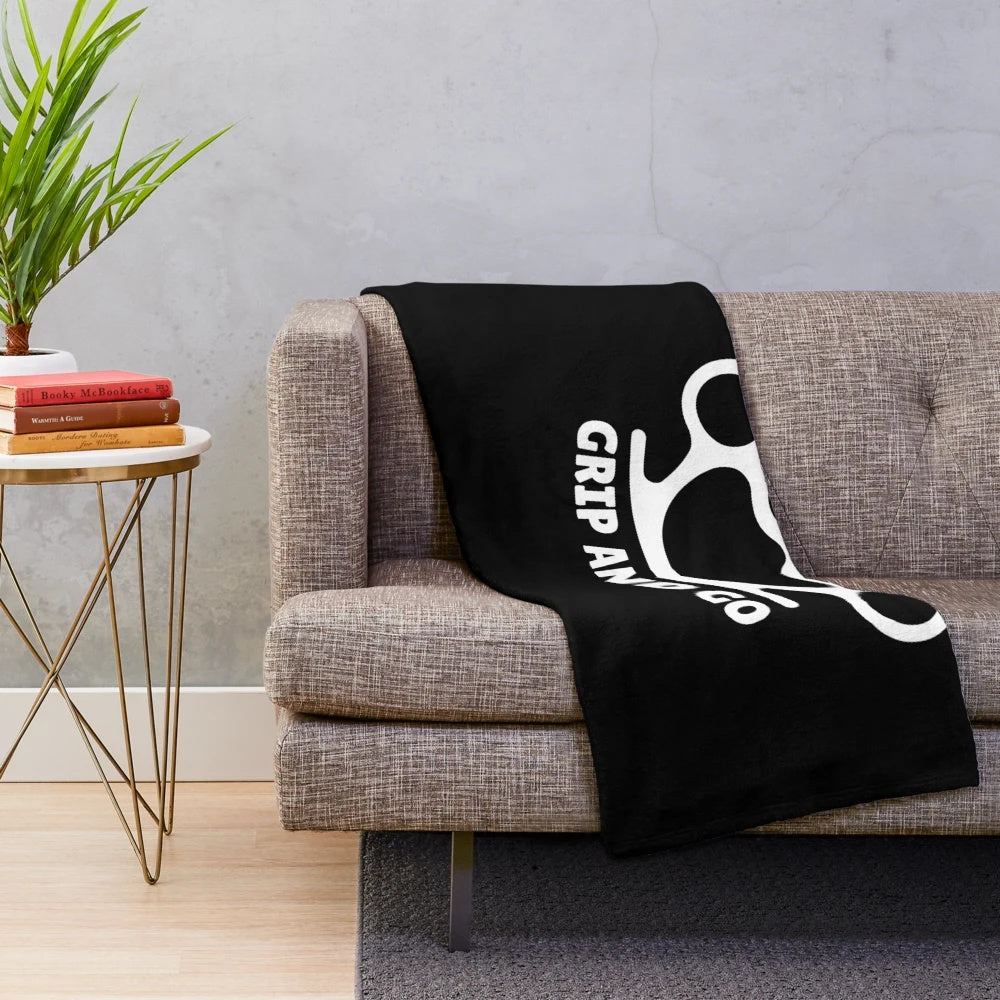 Knuckle-inspired plush blanket with metallic accents for street-ready style