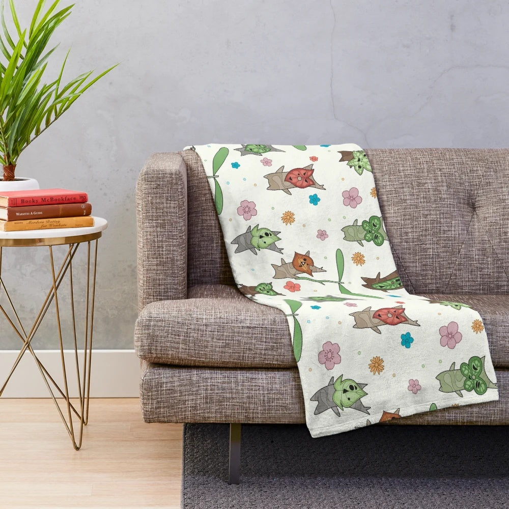 Korok pattern plush blanket with soft, cozy design for Zelda fans