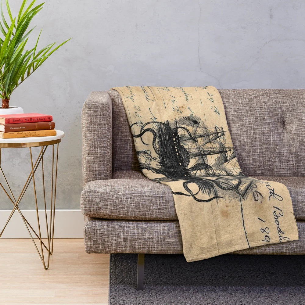 Kraken-themed plush blanket with vintage ship design