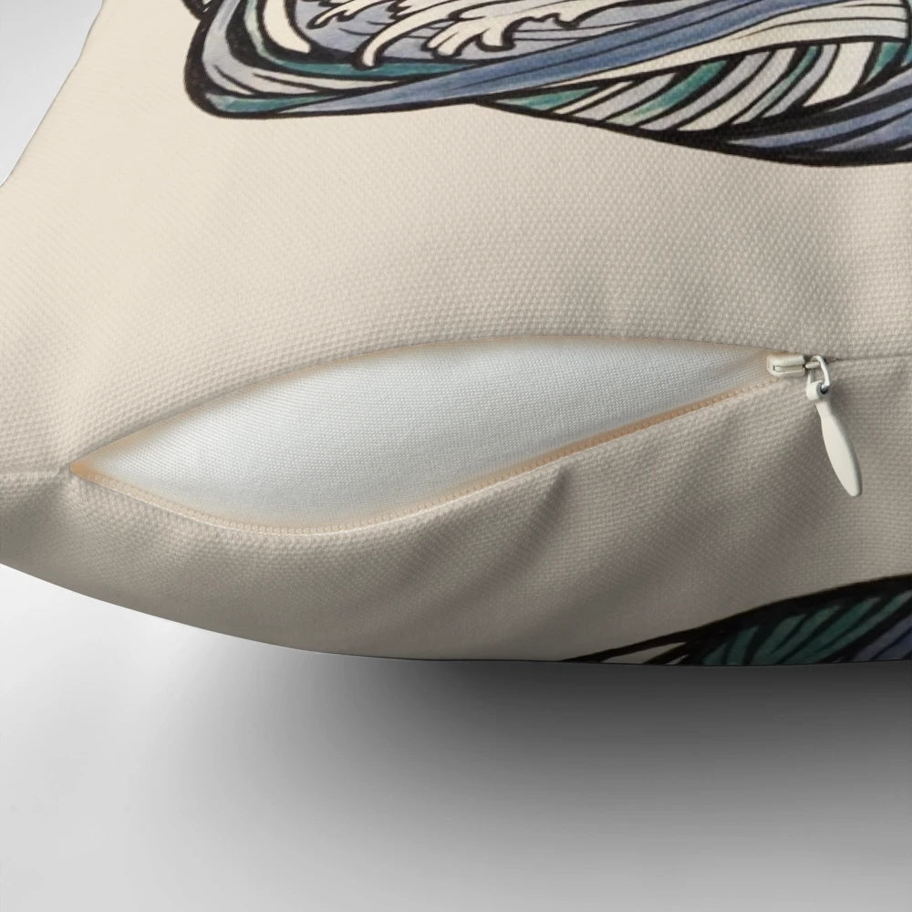 A decorative pillow featuring the legendary kraken, with tentacles swirling against a backdrop of waves and ships.