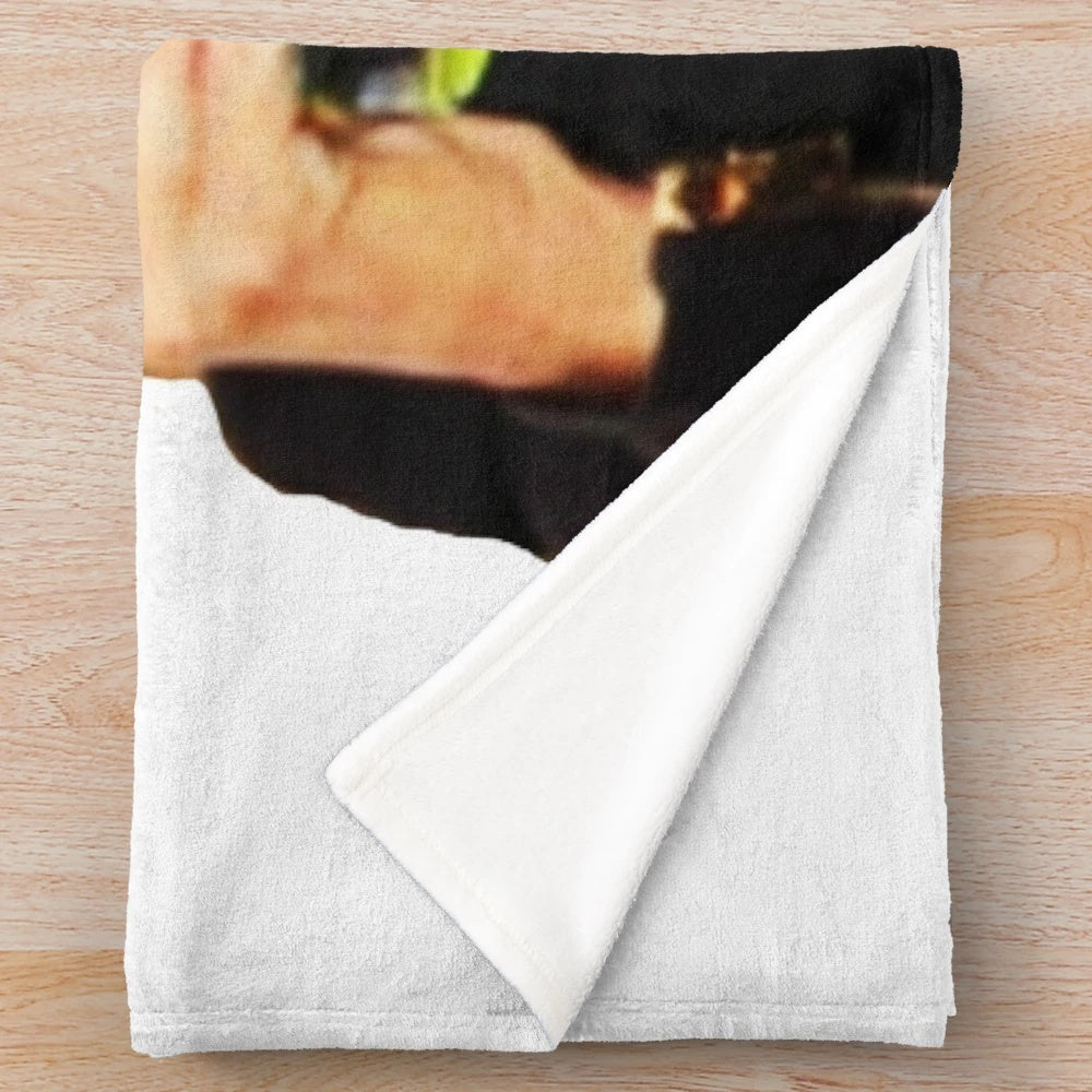 Kris Jenner-inspired plush blanket featuring a collage design of pop culture references