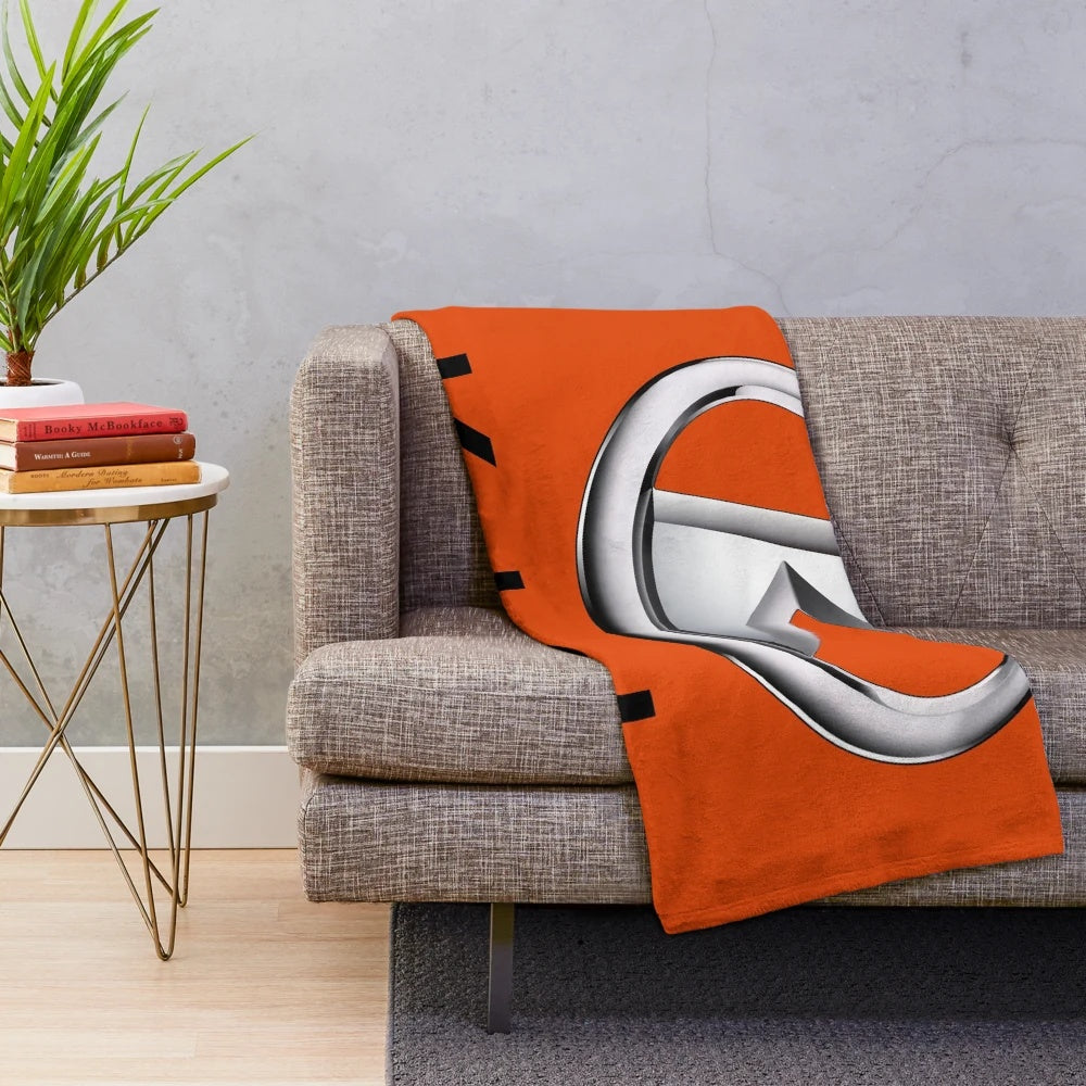 Kubota-inspired plush blanket with tractor logo