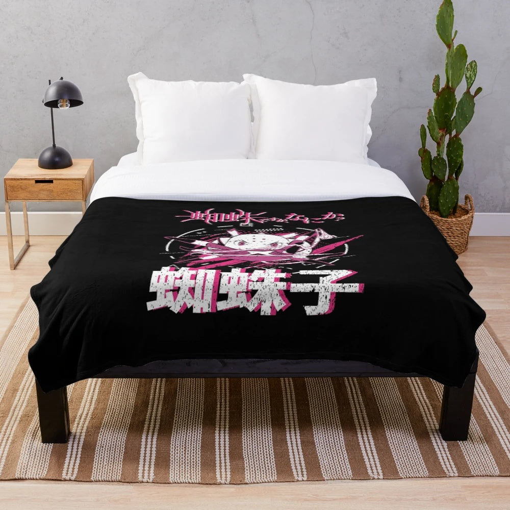 Kumoko from the anime "So I'm a Spider, So What?" on a plush blanket