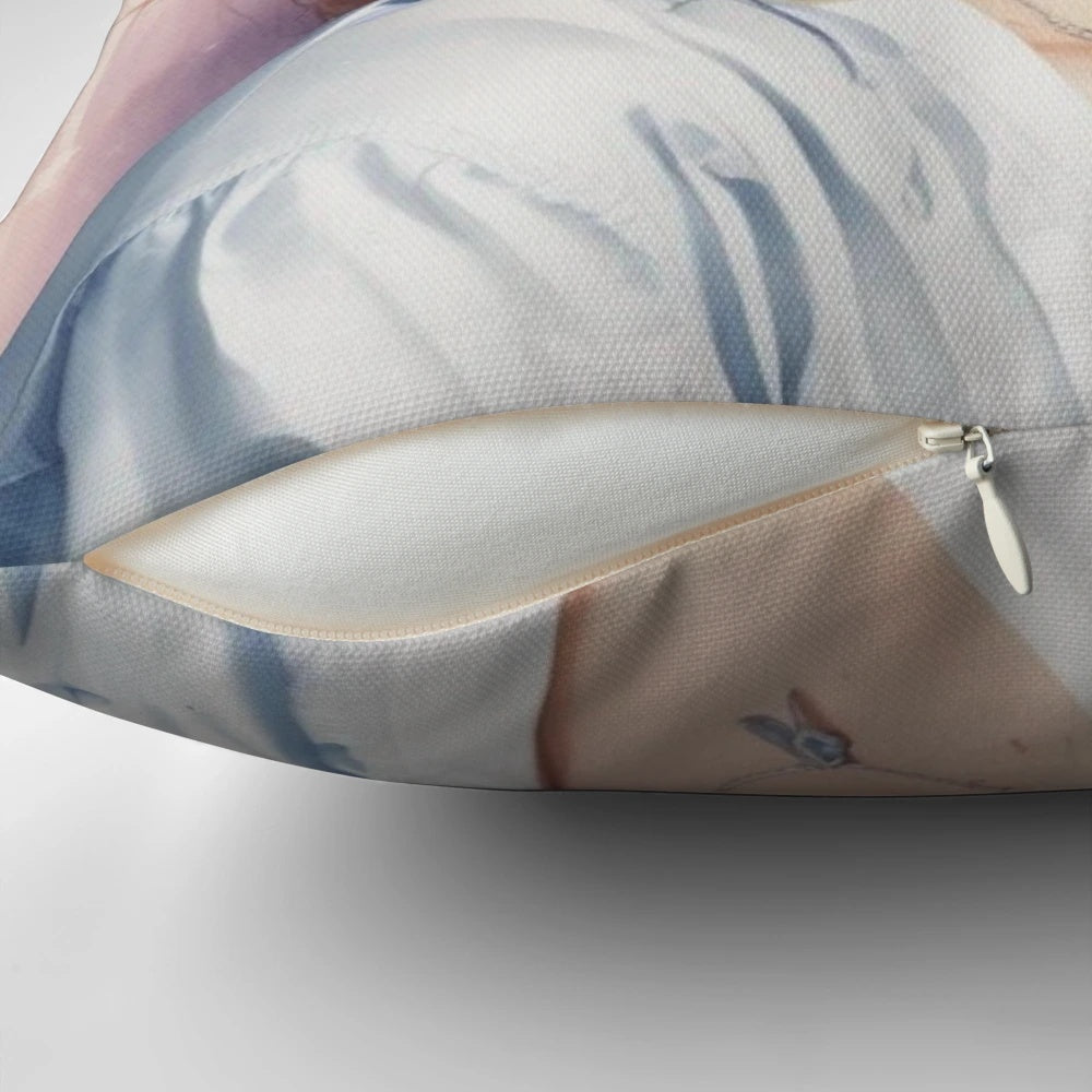 A plush, decorative pillow featuring the image of Australian singer and actress Kylie Minogue.