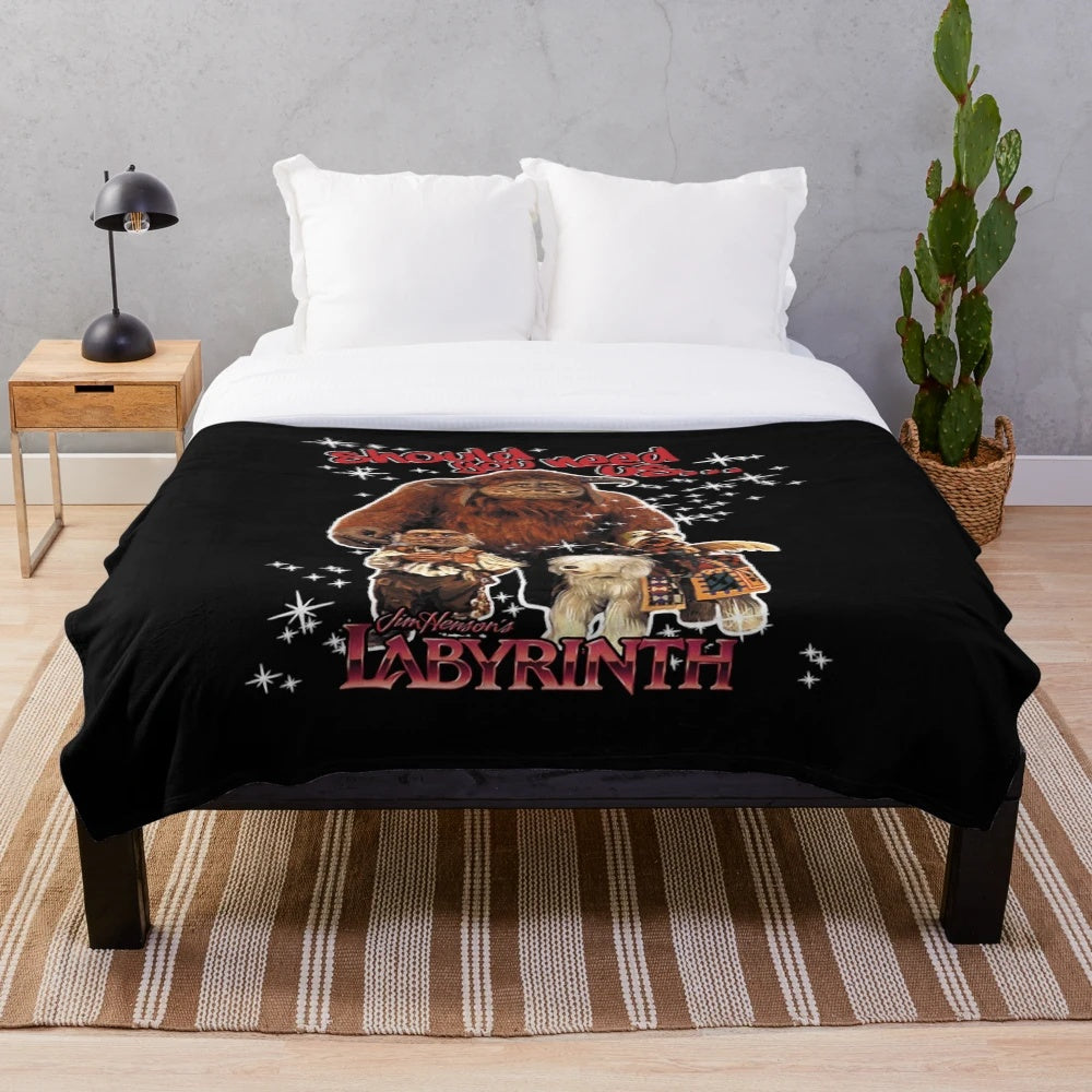Soft, cozy plush blanket featuring artwork inspired by the classic film Labyrinth