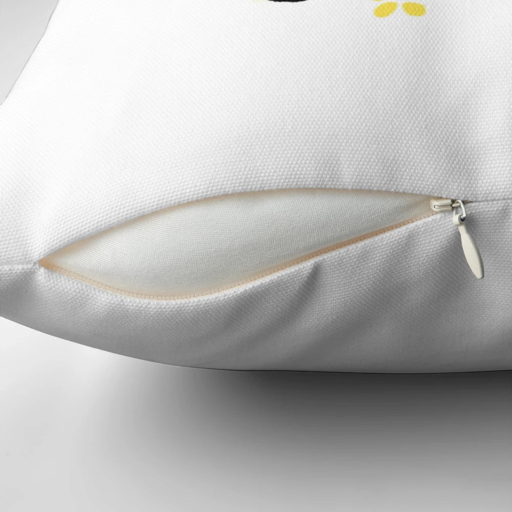 Decorative throw pillow featuring a cute, abstract watercolor ladybug on a leaf design.