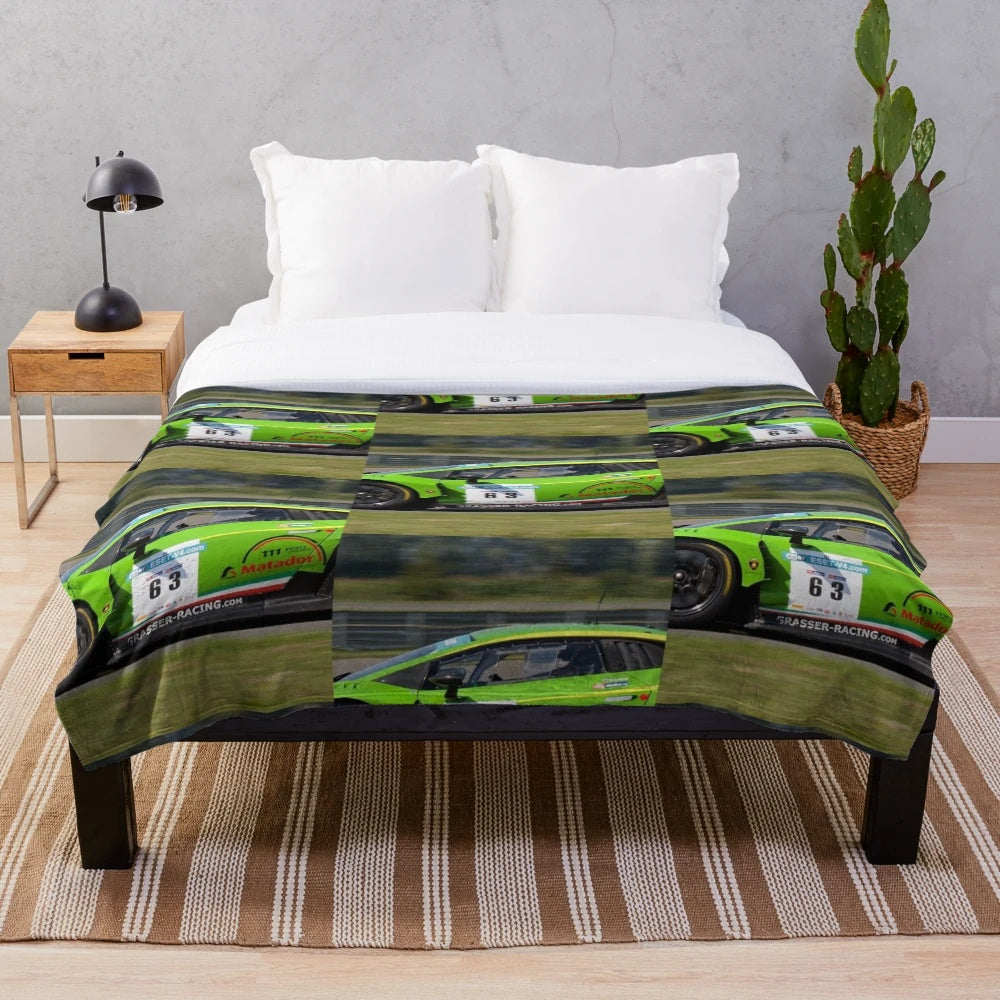 Plush blanket with a Lamborghini-inspired graphic design