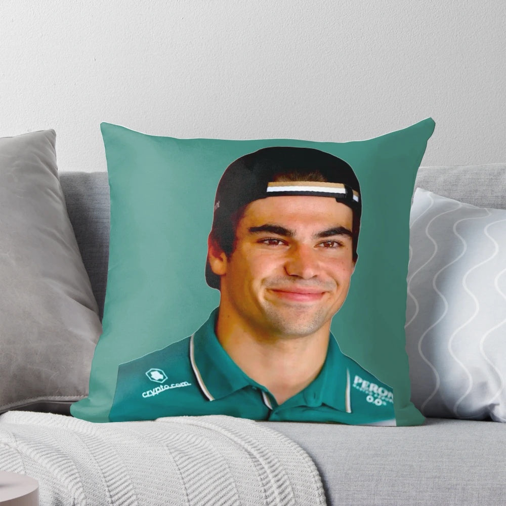 Lance Stroll, F1 driver for the Aston Martin F1 team, smiling in his racing suit.