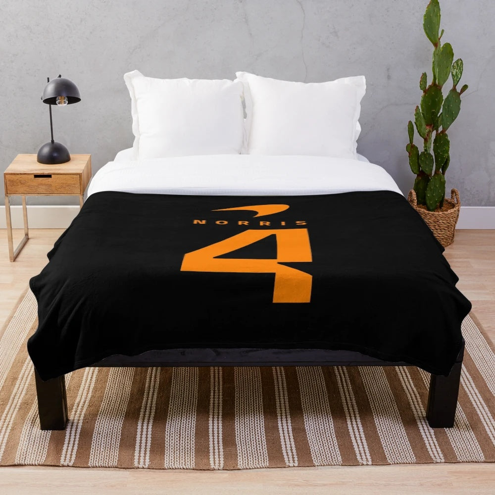 Lando Norris-inspired plush blanket featuring the motorsports driver's number 4 design