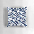 Large blue and white watercolor polka dot patterned decorative throw pillow