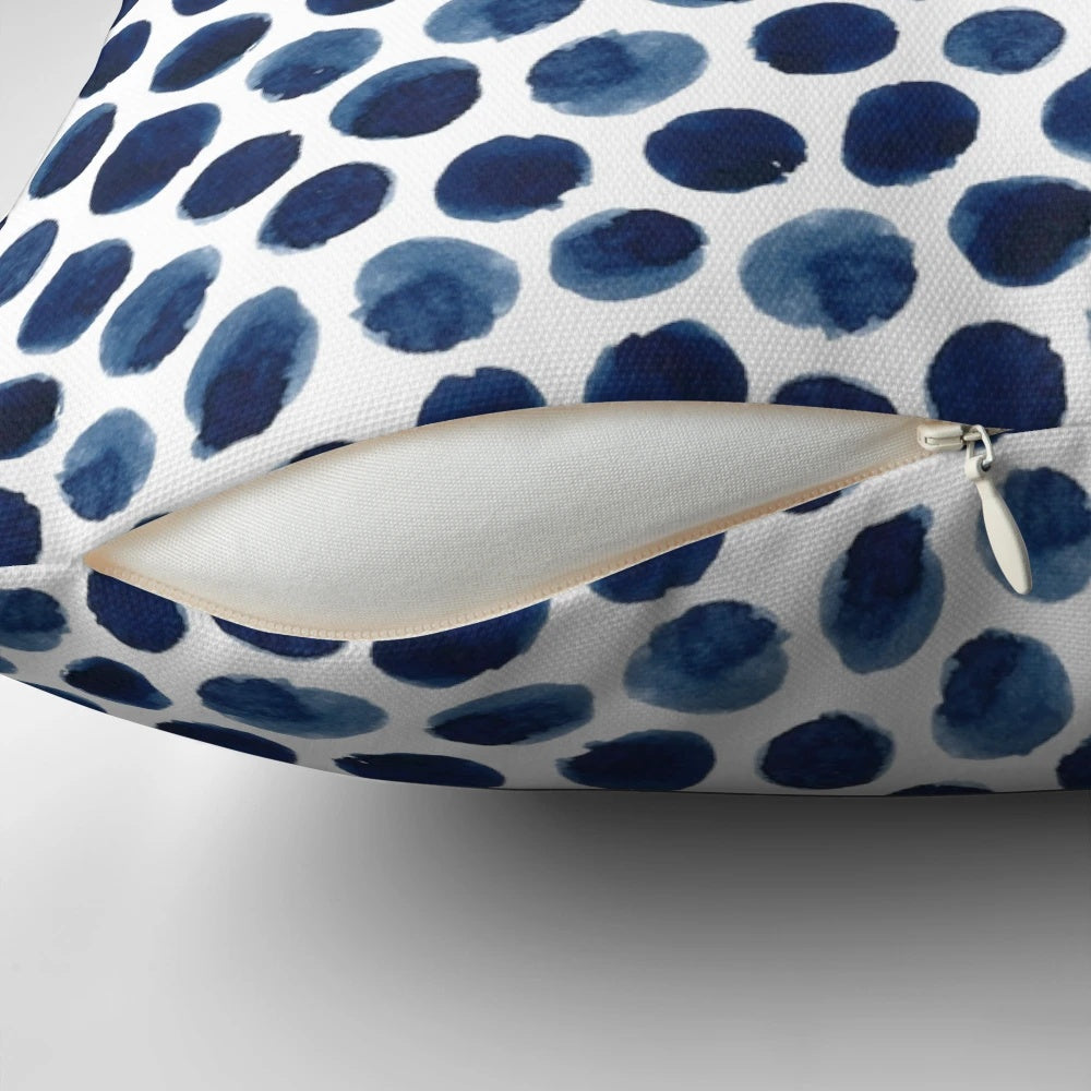 Large blue and white watercolor polka dot patterned decorative throw pillow
