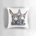 Colorful pastel illustration of a laughing donkey on a soft, plush pillow