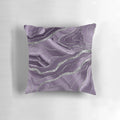 Closeup of a lavender agate glitter throw pillow with a modern, abstract design