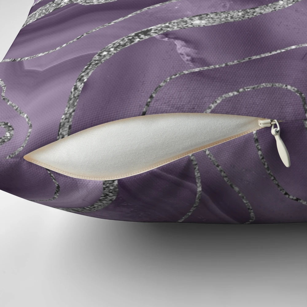Closeup of a lavender agate glitter throw pillow with a modern, abstract design