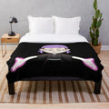 Amity Blight from The Owl House with lavender hair on a plush blanket