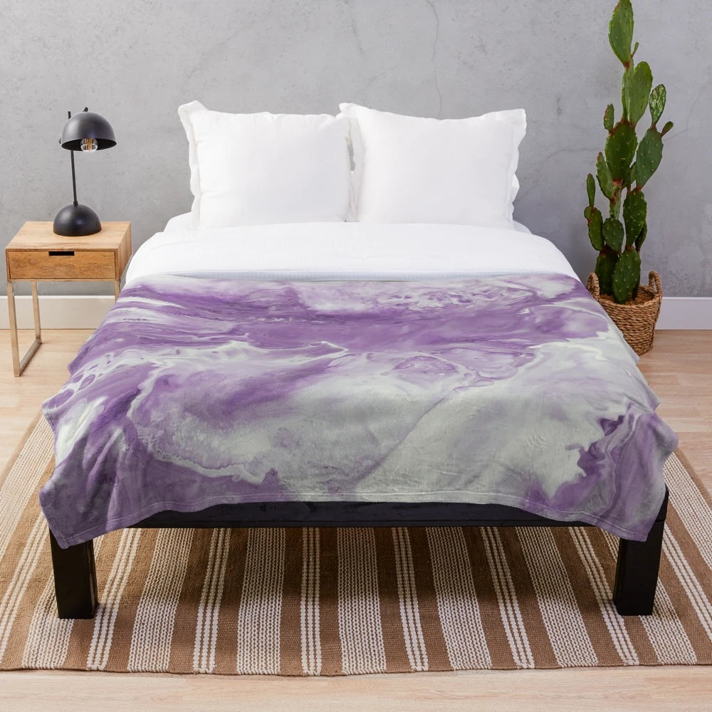 Lavender watercolor floral pattern on a soft and cozy plush blanket