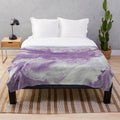 Lavender watercolor floral pattern on a soft and cozy plush blanket