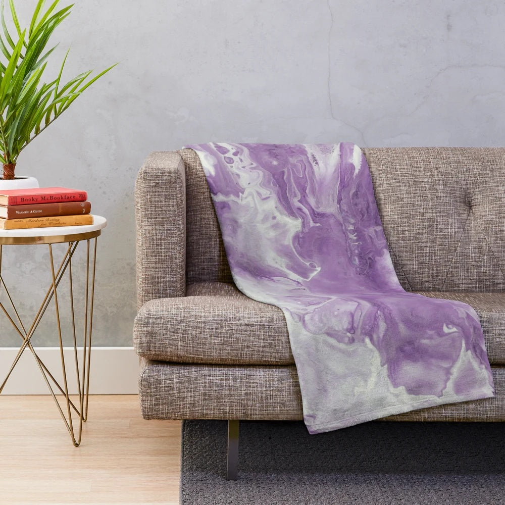 Lavender watercolor floral pattern on a soft and cozy plush blanket
