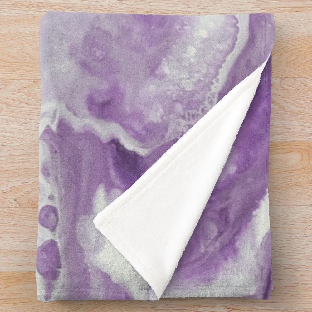 Lavender watercolor floral pattern on a soft and cozy plush blanket