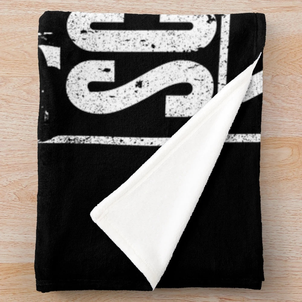Plush blanket featuring The Office inspired "Lazy Scranton" design