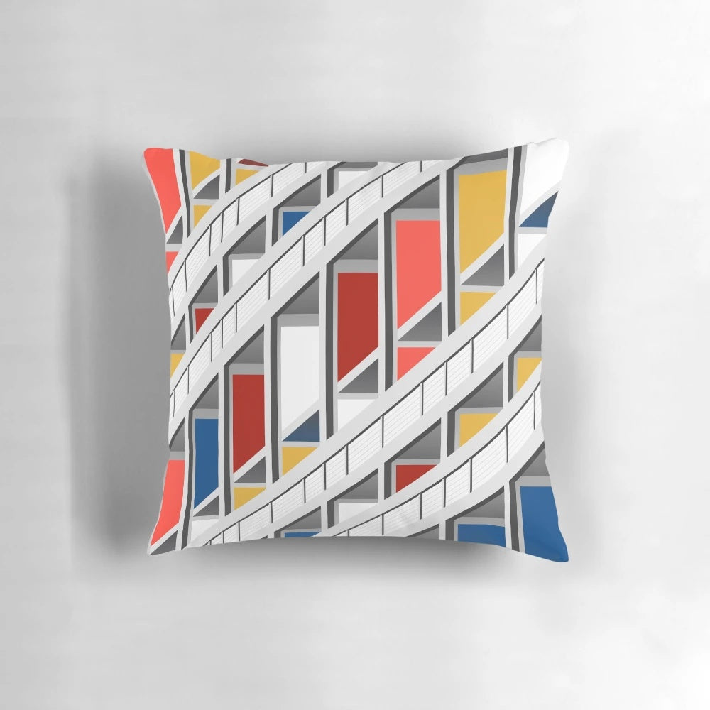 Le Corbusier inspired architectural illustration pillow featuring abstract geometric shapes and primary colors.