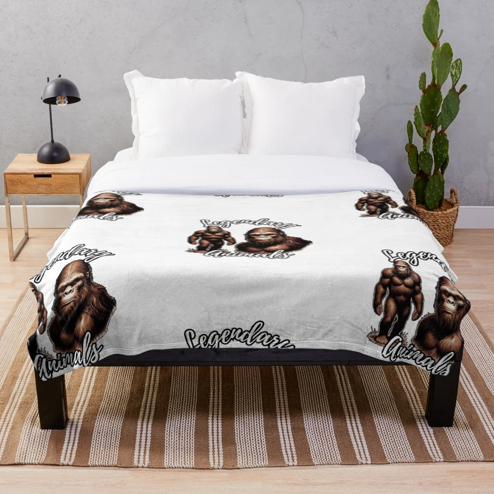 Plush blanket with colorful illustrations of legendary animals like Bigfoot, Sasquatch, and Yeti