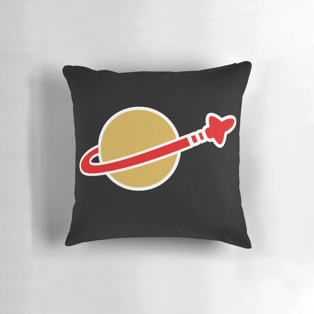 A plush, decorative throw pillow featuring a Lego-style spaceman or astronaut design.