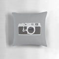 A soft, stylish Leica camera-inspired pillow for photography enthusiasts