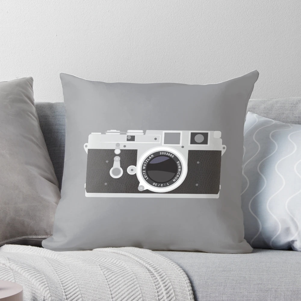 A soft, stylish Leica camera-inspired pillow for photography enthusiasts