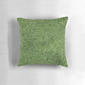 Plush pillow with realistic astroturf texture and lush green color, perfect for sports-themed decor.