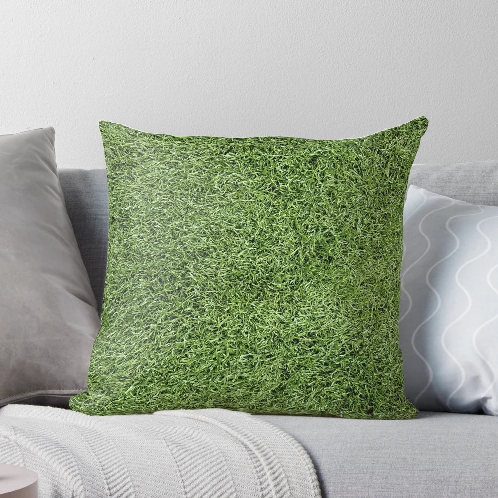 Plush pillow with realistic astroturf texture and lush green color, perfect for sports-themed decor.