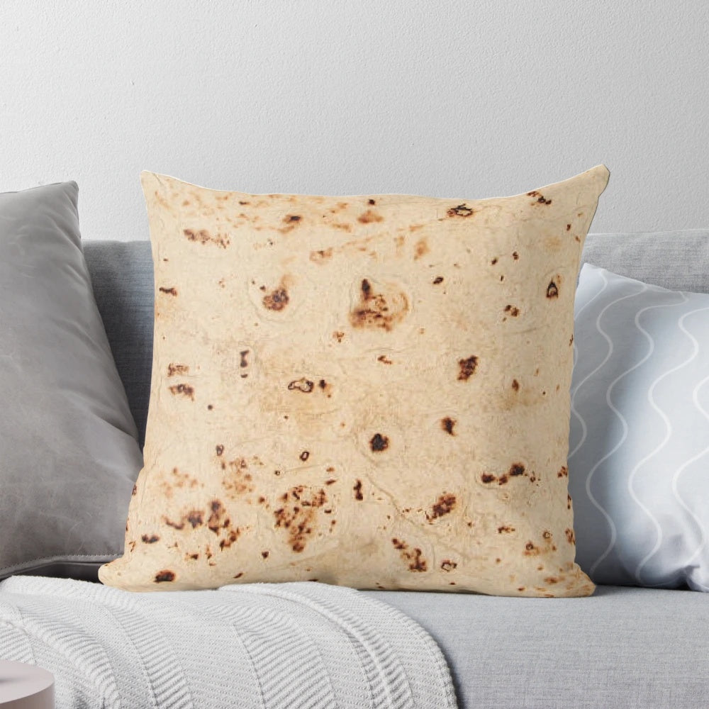 Realistic-looking tortilla-shaped pillow for a unique Mexican-themed home decor accent.